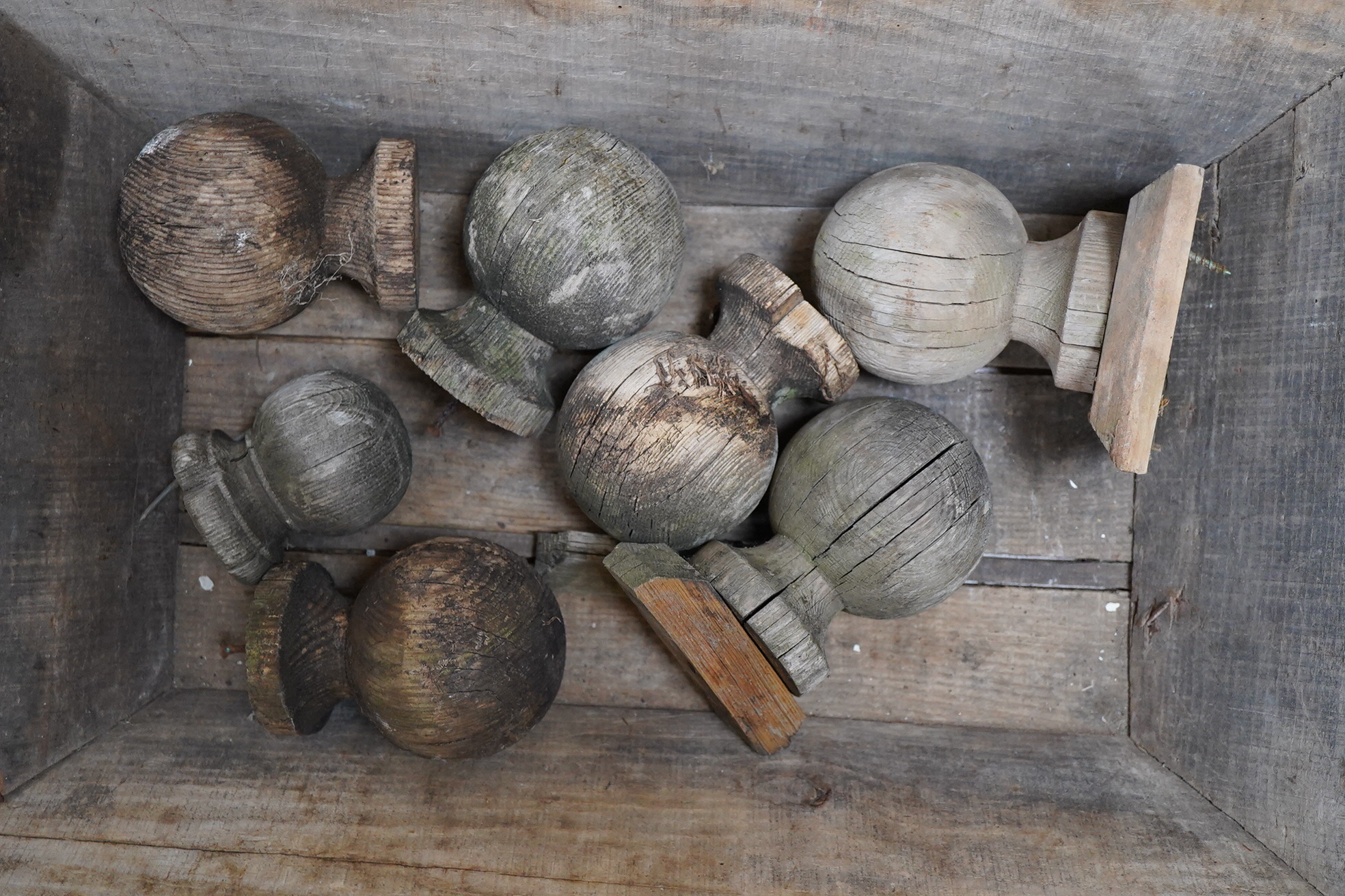 A wood dough bin and various wood finials, largest 77cm